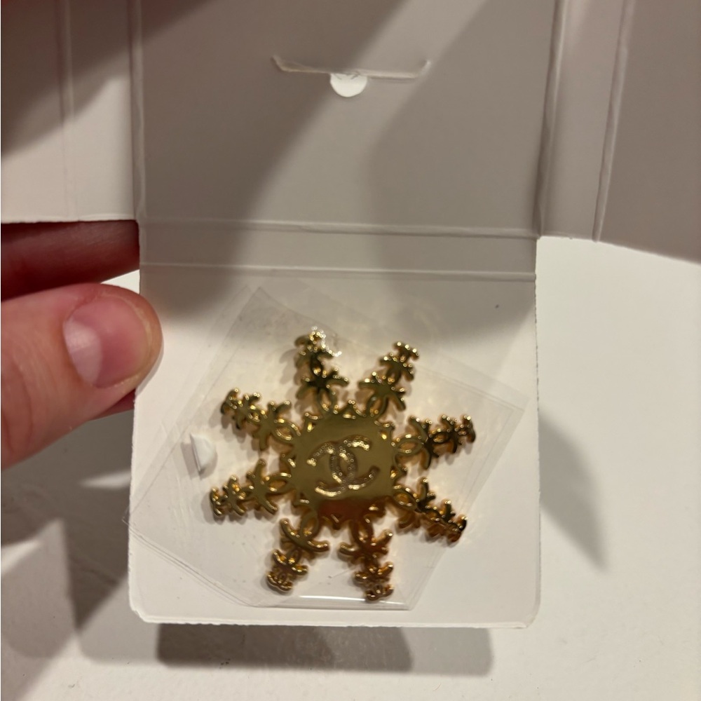 Chanel Gold Snowflake Brooch